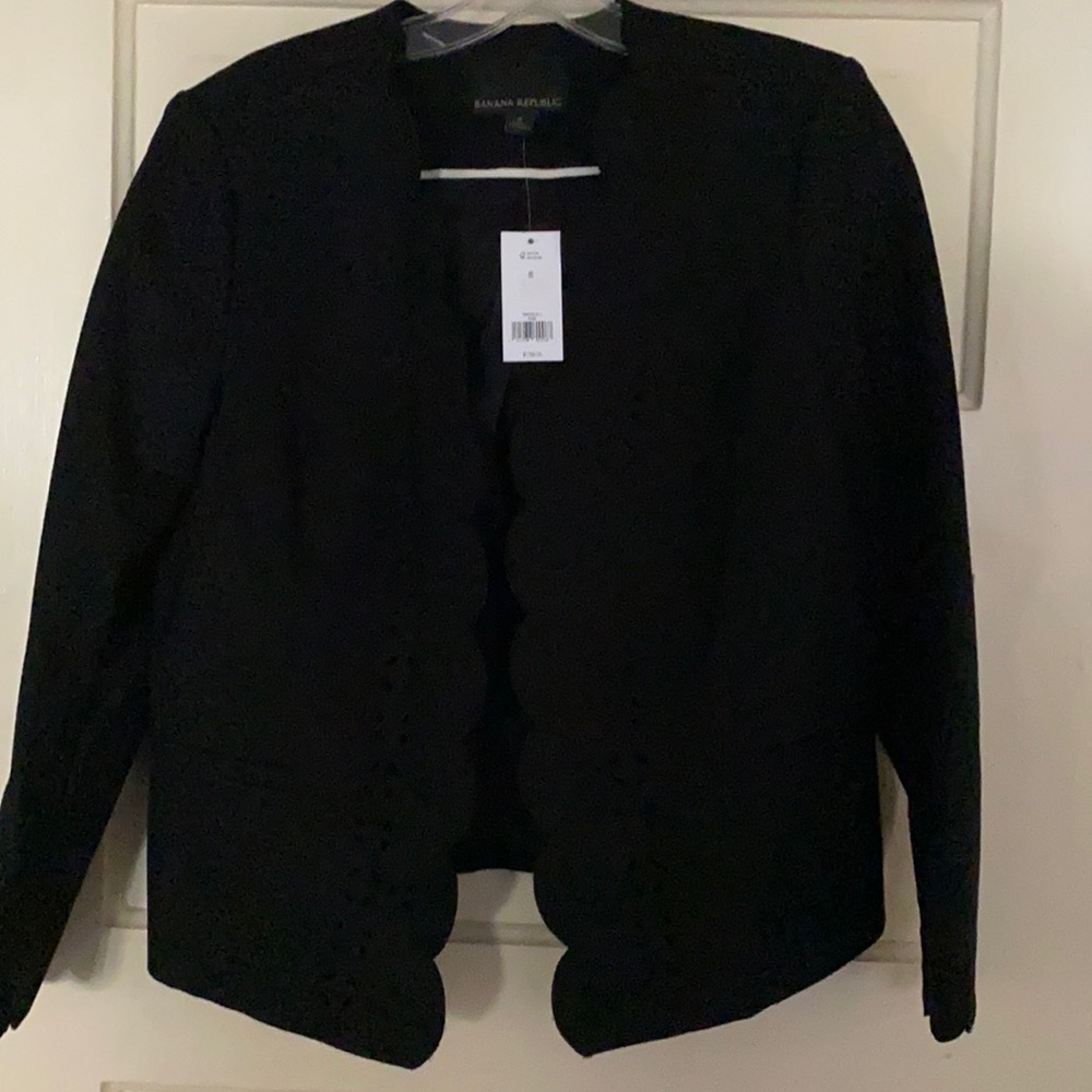 Gorgeous black lined jacket with cut-out detail